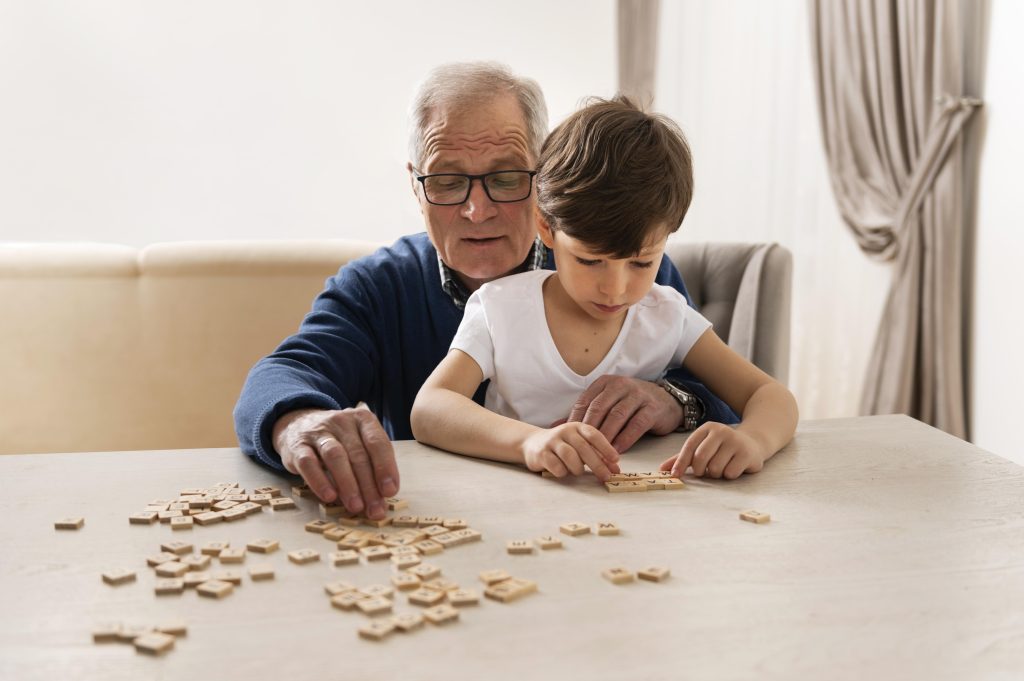 little boy playing with his grandfather (1)